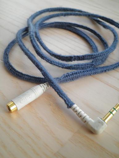 Earphone cord cozy